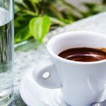 why do you drink coffee with water?
